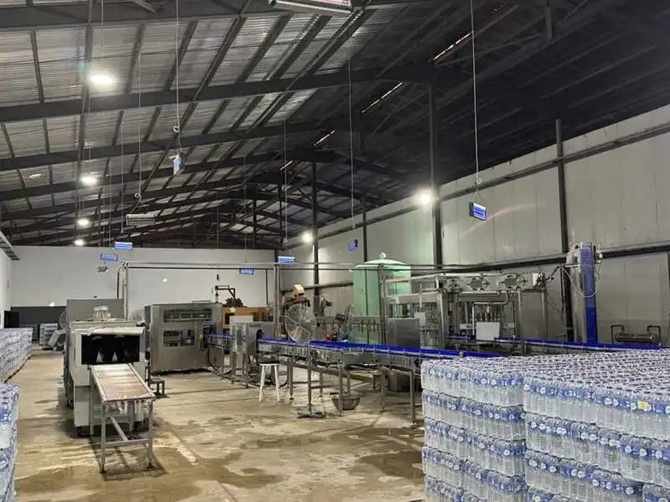 lpack Revisits Nigeria Customer | 8,000 BPH 750ml Bottled Water Filling Line Running Steadily Subtitle: Zhangjiagang lpack Machine Co., Ltd – Africa Market Case Study