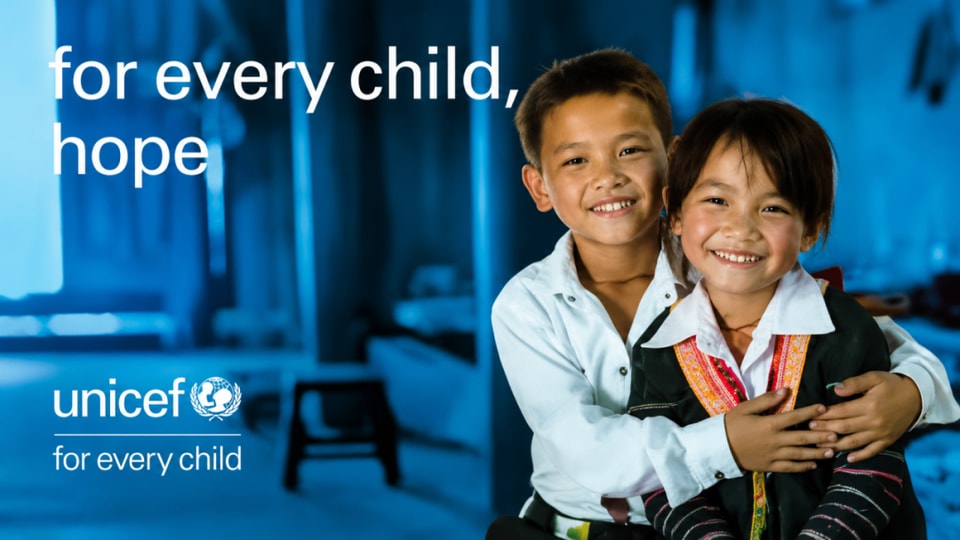 UNICEF for every child campaign image featuring two smiling children