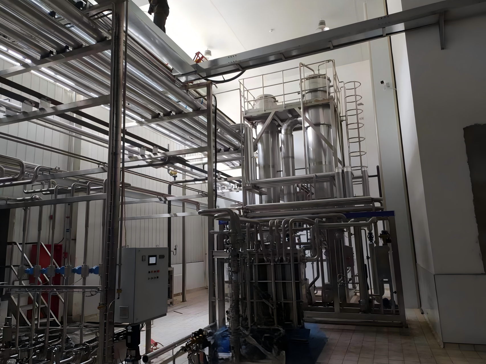 Système d’évaporation sous vide à film tombant