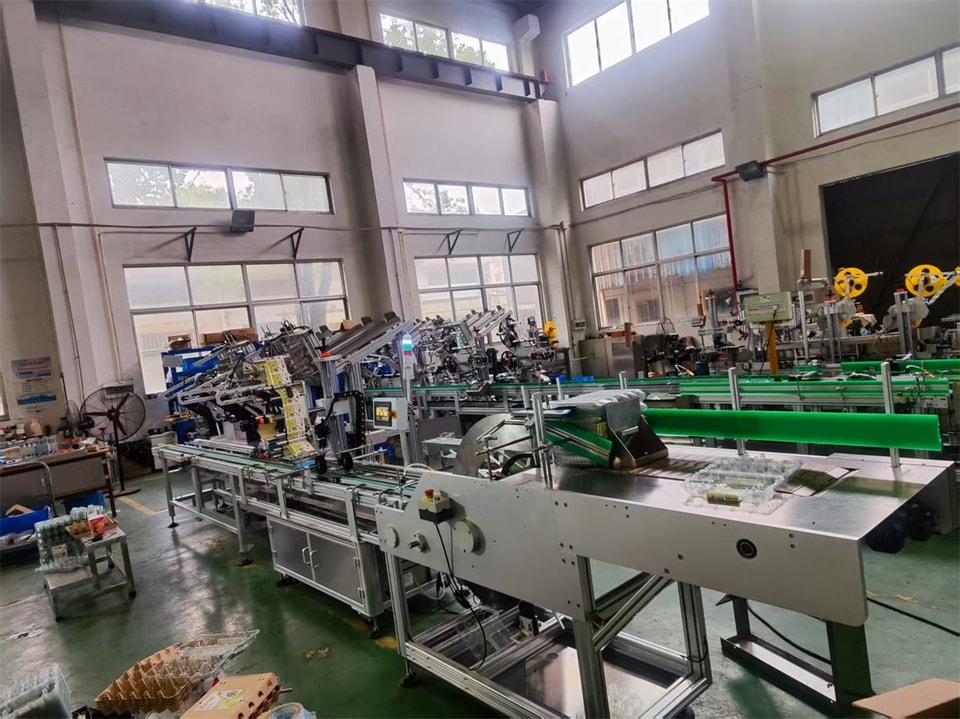 Egg box clamshell labeller.jpg