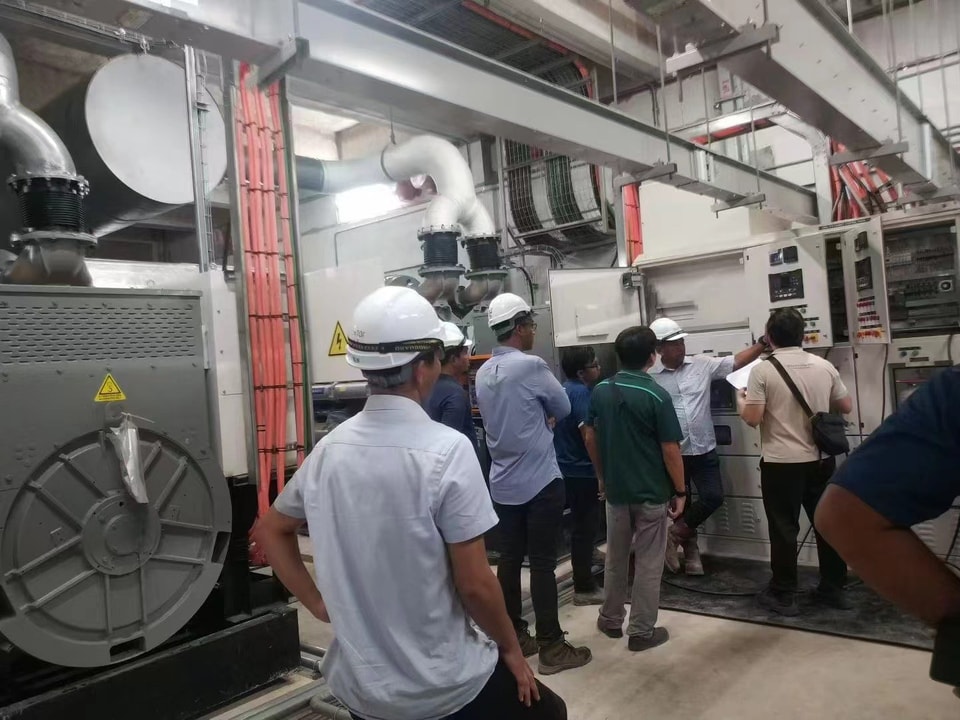 Vantek Power engineers conducting an on-site generator system consultation
