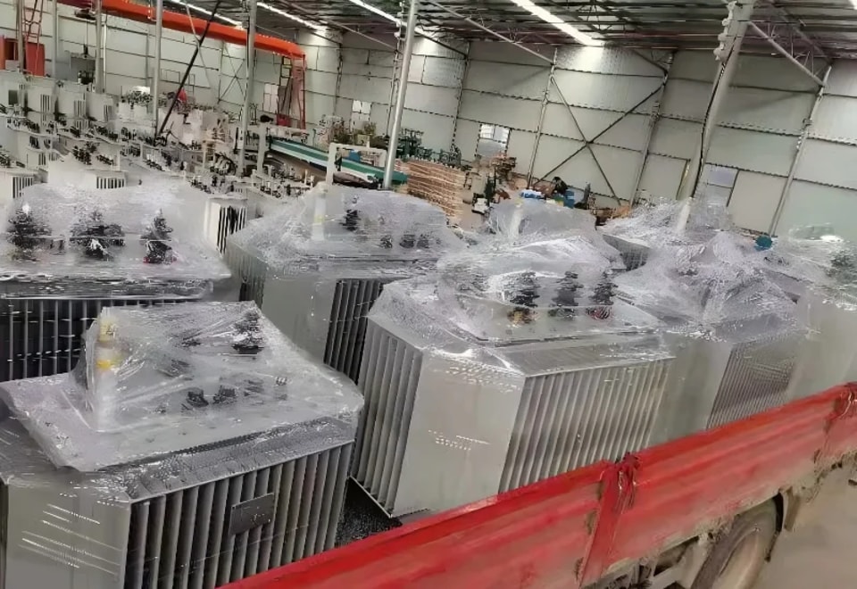 Wrapped transformers secured on the trailer bed